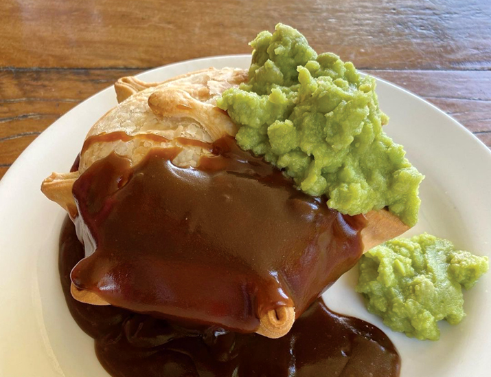 Pinnacle Pup pie with a side of mushy peas and gravy