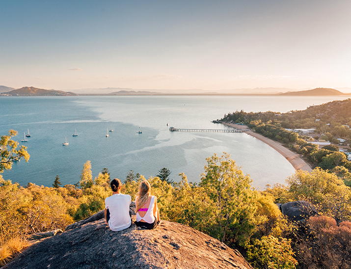 A couple sit overlooking Hawkers Point