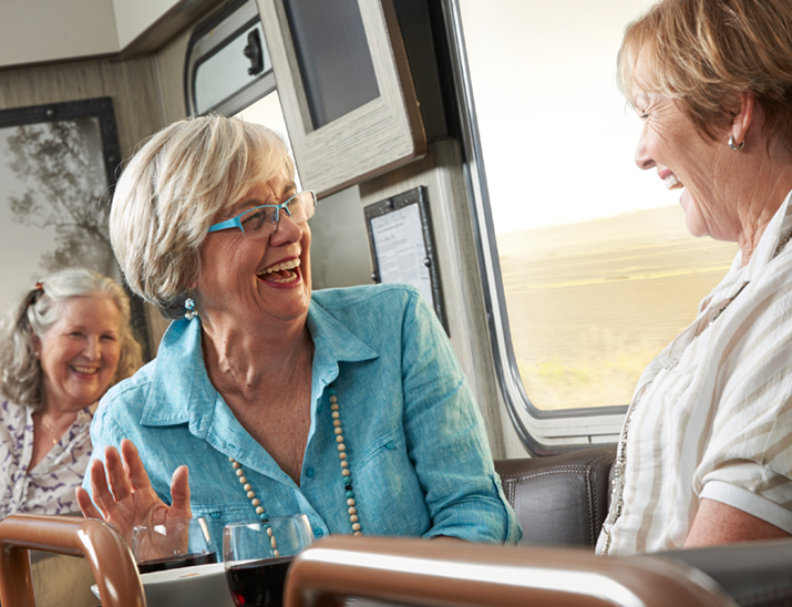 Customers socialising in the Shearers Rest carriage  aboard the Spirit of the Outback train